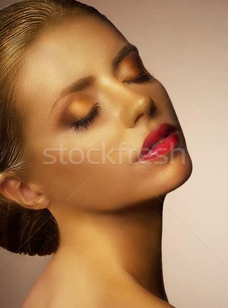 Bodypainting. Gilded Woman's Face. Fancy Golden Make Up Stock photo © gromovataya