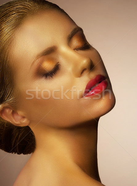 Bodypainting. Gilded Woman's Face. Fancy Golden Make Up Stock photo © gromovataya