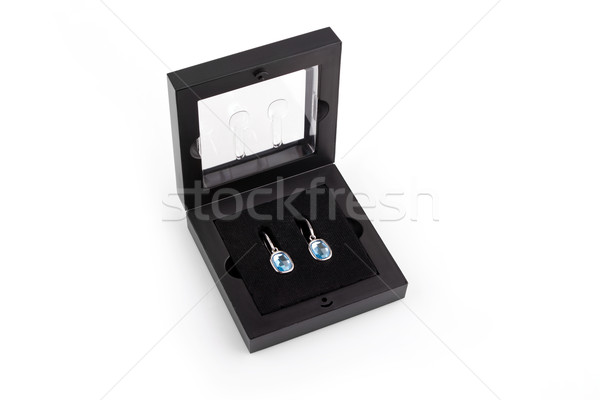 Pair of sapphire earrings in a gift box isolated on white backgr Stock photo © gsermek
