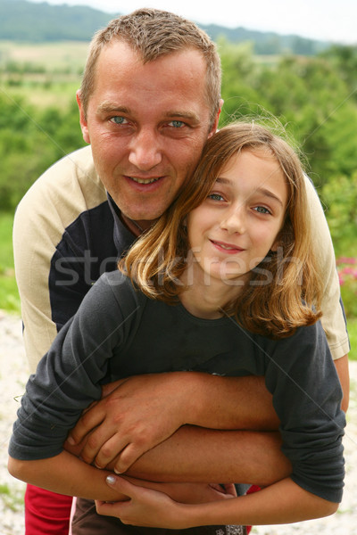 Father and daughter in a hug Stock photo © gsermek