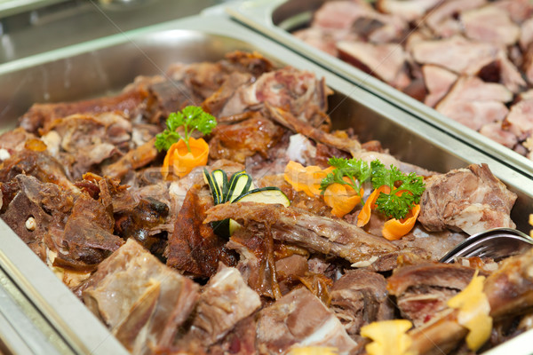 Lamb meat in a heated tray Stock photo © gsermek