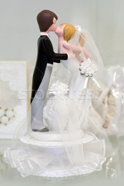 Bride and groom figurines kissing Stock photo © gsermek