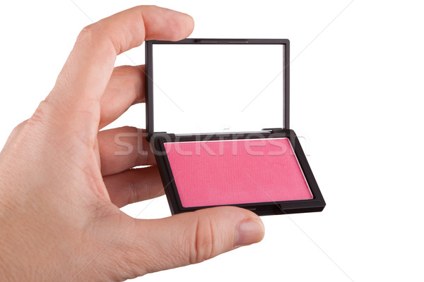 Female hand holding a pink blush, isolated on white Stock photo © gsermek