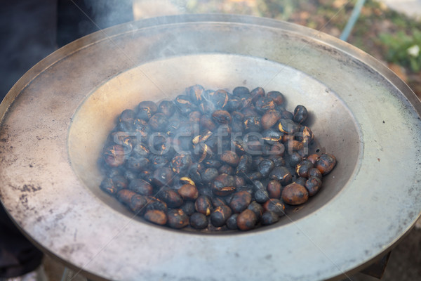 Roasting chestnuts Stock photo © gsermek