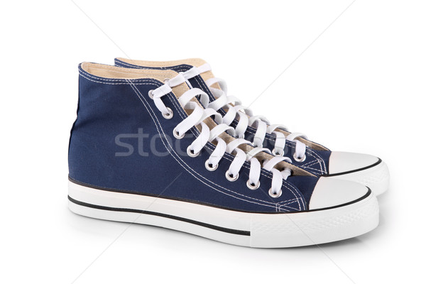 Pár új kék sportcipők fehér nő Stock fotó © gsermek