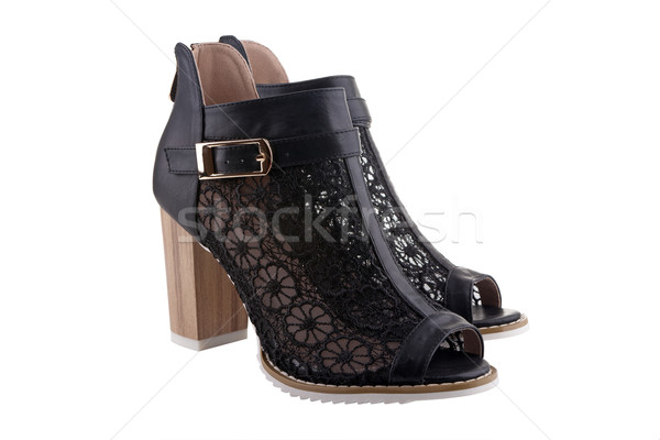 Stock photo: Female shoes with black lace, white sole and a wooden heel, isol