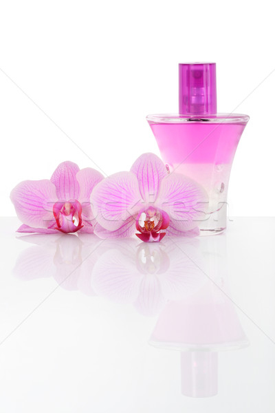 Oil base perfume and orchid flowers Stock photo © gsermek