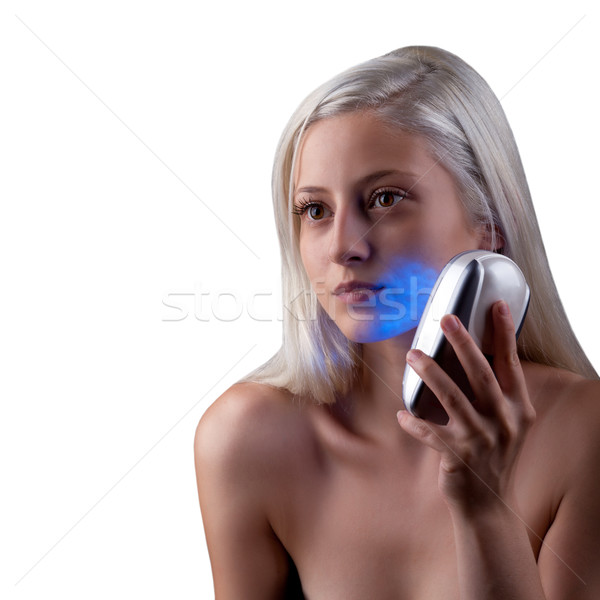 Young woman getting photo-therapy treatment Stock photo © gsermek