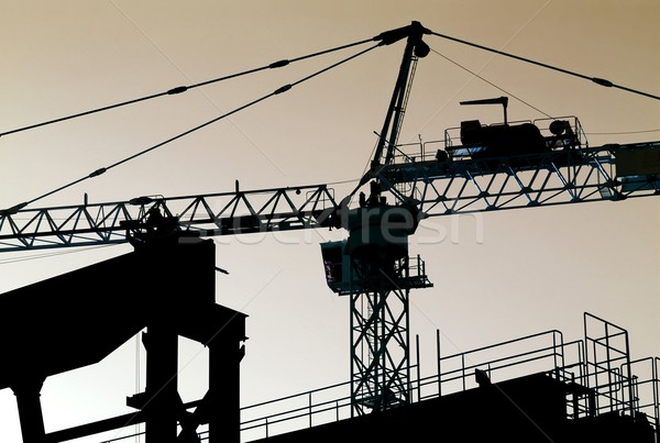 Stockfoto: Kraan · silhouet · toren · bouwplaats · business · hemel