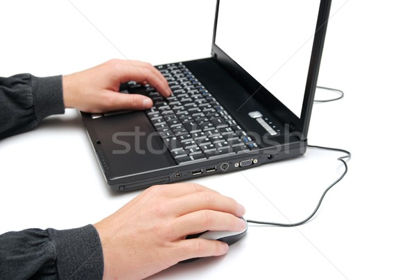 Laptop man met behulp van laptop geïsoleerd witte hand Stockfoto © Gudella