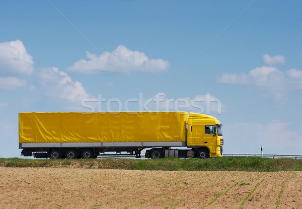 Camion jaune autoroute route bleu industrie [[stock_photo]] © Gudella