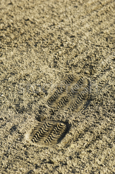 Chaussures imprimer sable randonnée empreinte Photo stock © Habman_18