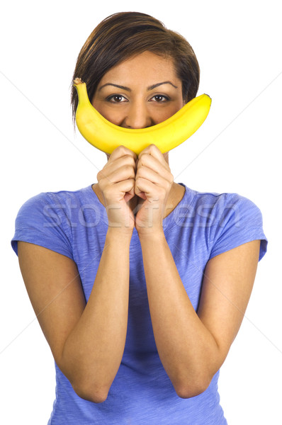 Fiatal kisebbségi nő banán mosoly fiatal nő Stock fotó © Habman_18