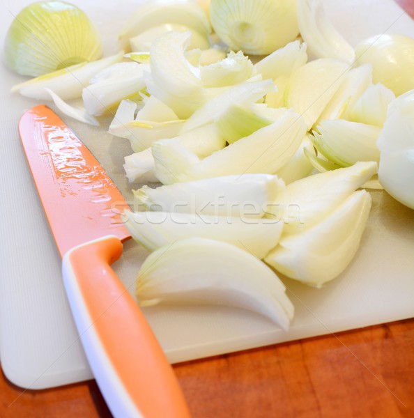 Kıyılmış soğan turuncu seramik bıçak beyaz Stok fotoğraf © hamik