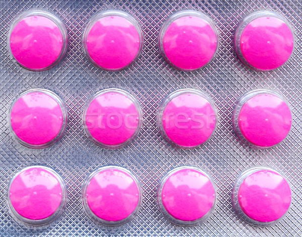 Tabletták hólyag csomag közelkép rózsaszín fájdalom Stock fotó © hamik