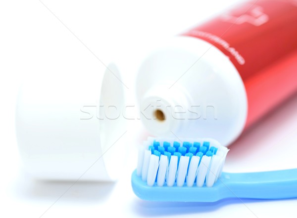 Zahnbürste Zahnpasta blau Zahn Rohr weiß Stock foto © hamik