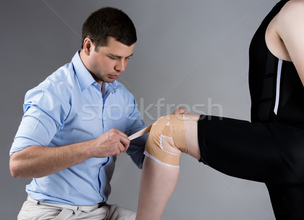 Adult male physiotherapist Stock photo © handmademedia