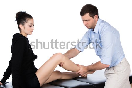 Physiotherapist massaging patient Stock photo © handmademedia