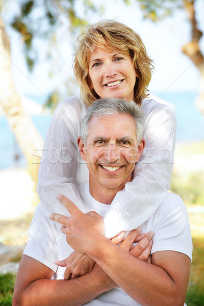 Stock photo: Mature couple smiling