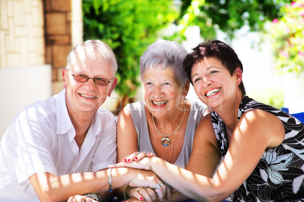 Familia feliz familia mano sonrisa hombre mujeres Foto stock © hannamonika