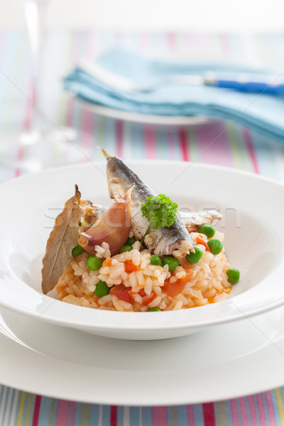 Rice with sardines Stock photo © hansgeel