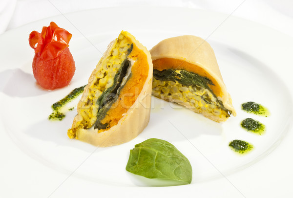 Potato roulade with spinach, carrot and curry rice Stock photo © hanusst