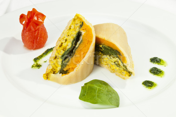 Potato roulade with spinach, carrot and curry rice Stock photo © hanusst