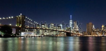 New York sziluett híd éjszaka Freedom Tower üzlet Stock fotó © hanusst