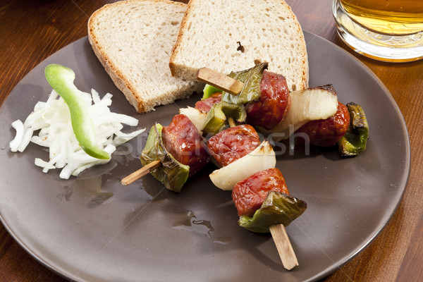 Grilled sausage on spit Stock photo © hanusst