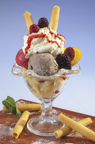 Cream ice sundae w fruit and whipped cream Stock photo © hanusst