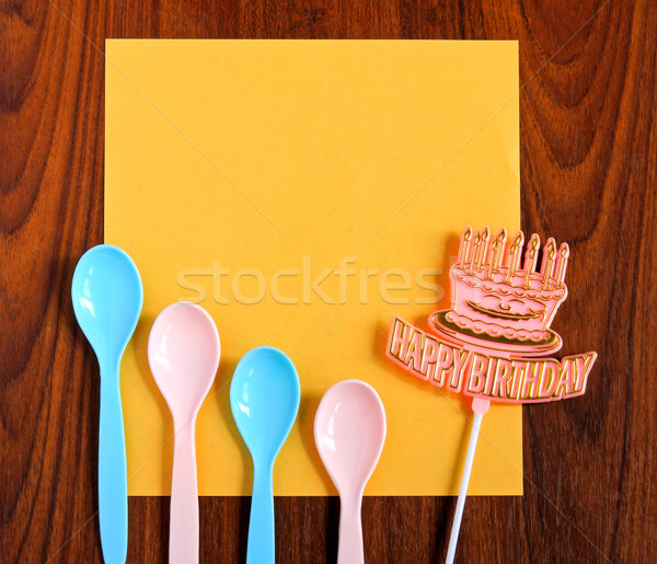 happy birthday and spoons with yellow paper on wooden background Stock photo © happydancing
