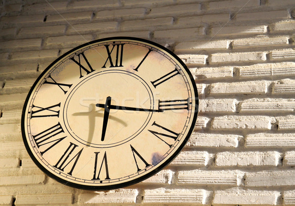 vintage wall clock on brickwall Stock photo © happydancing