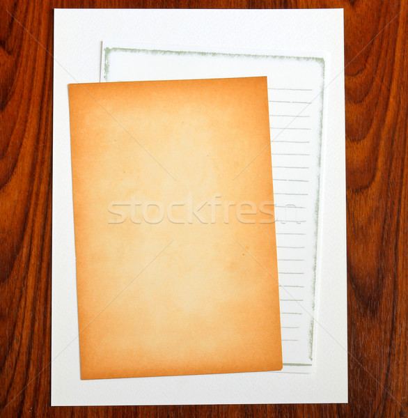 Blank notepaper on wooden background Stock photo © happydancing