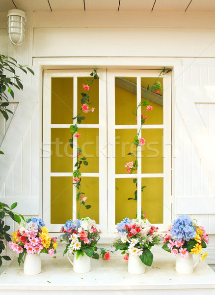 Dekore edilmiş çiçek pencere bahçe ev duvar Stok fotoğraf © happydancing