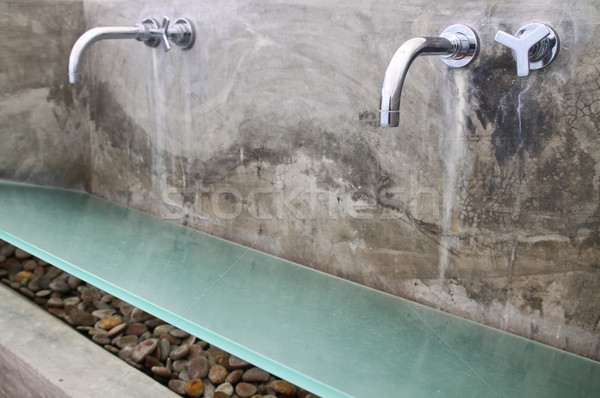 sinks and taps in a public toilet  Stock photo © happydancing
