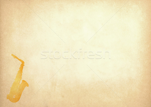 Grunge image of saxophone from old paper with copy space Stock photo © happydancing