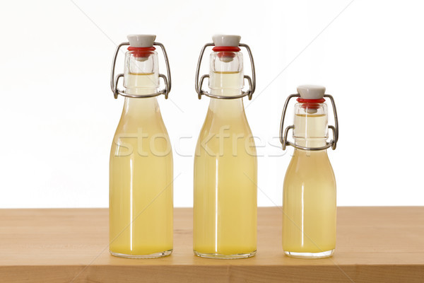 Bottles filled with elderflower syrup Stock photo © haraldmuc