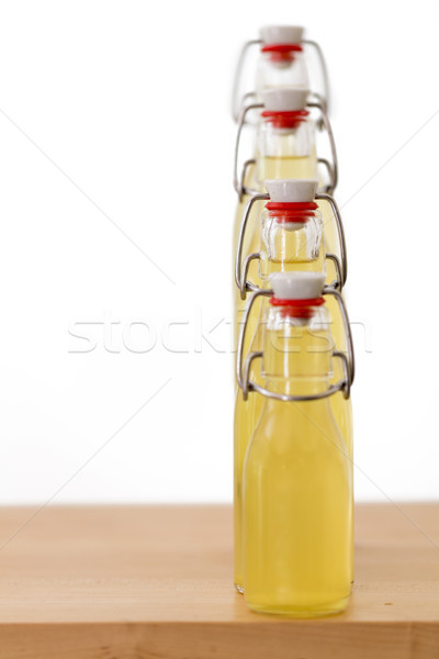 Bottles filled with elderflower syrup, shallow DOF Stock photo © haraldmuc