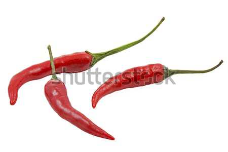 Three red hot chilies isolated on white background Stock photo © haraldmuc