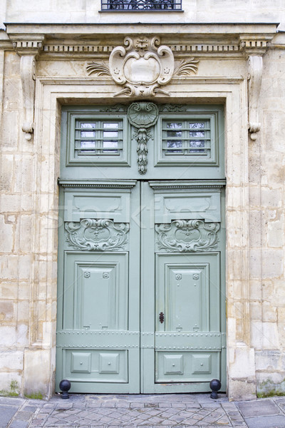 Historic wooden door, seen in Paris, France Stock photo © haraldmuc