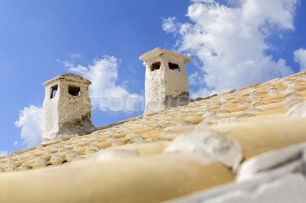 Kettő csempézett tető Görögország ház felhők Stock fotó © haraldmuc