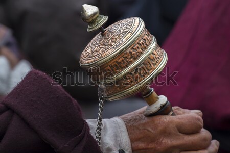 Ladakhi holding buddhist prayer wheel, Ladakh, India Stock photo © haraldmuc