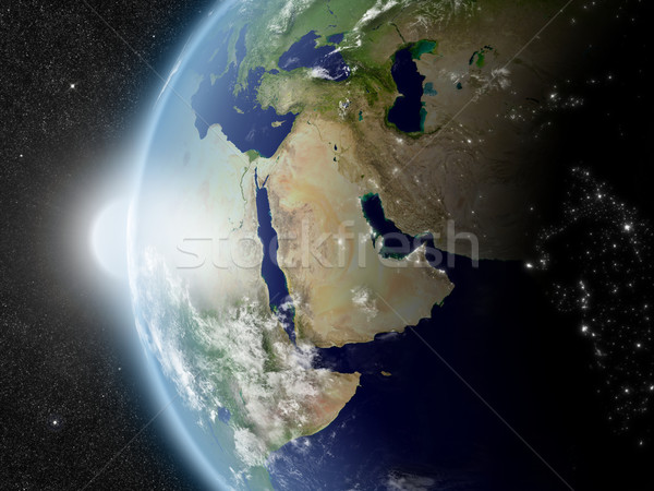 Güneş Orta Doğu gün batımı bölge dünya gezegeni uzay Stok fotoğraf © Harlekino