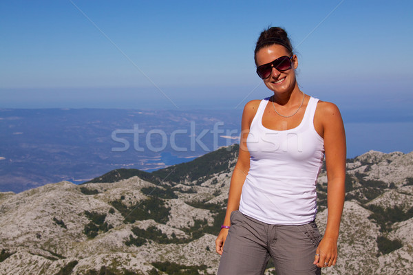 Smiling girl with panorama Stock photo © Harlekino