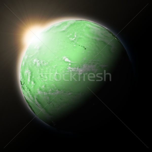 Sun over Pacific Ocean on green planet Earth Stock photo © Harlekino