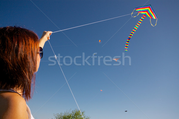 Fille jouer kite jeune fille coloré battant Photo stock © Harlekino