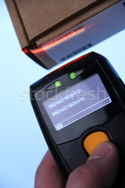 Cod de bare scanner mână afaceri lumina Imagine de stoc © Hasenonkel