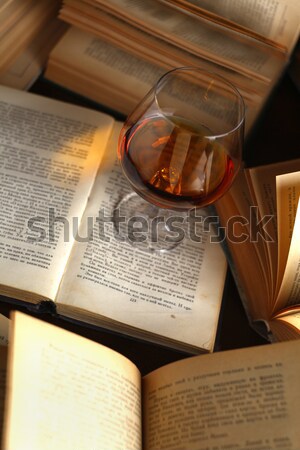 Vidrio brandy libros pie abierto beber Foto stock © hiddenhallow