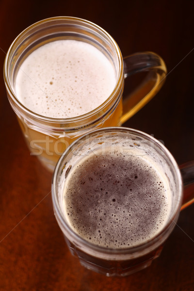 Cam bira iki ahşap masa ahşap içmek Stok fotoğraf © hiddenhallow