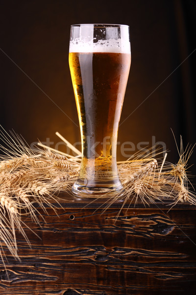 Glass of beer on a chest Stock photo © hiddenhallow